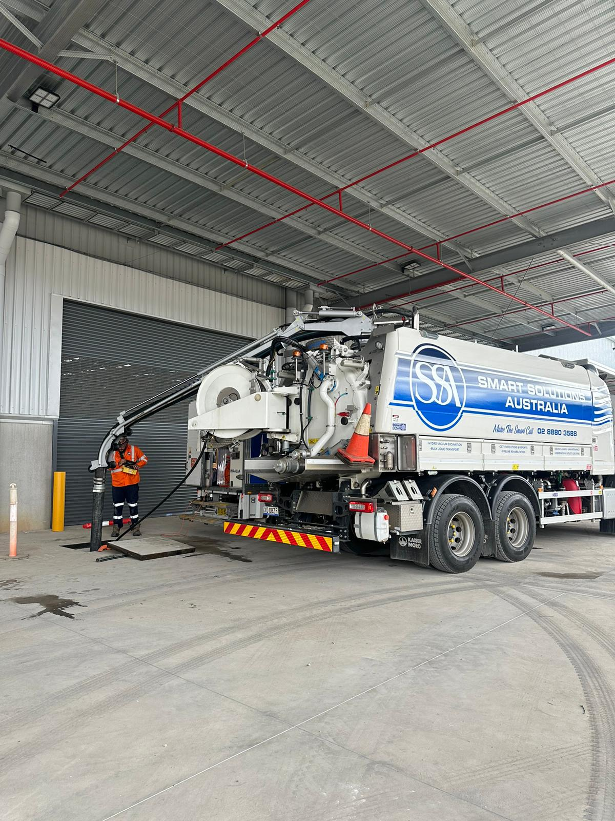 Combination unit servicing drainage infrastructure under cover