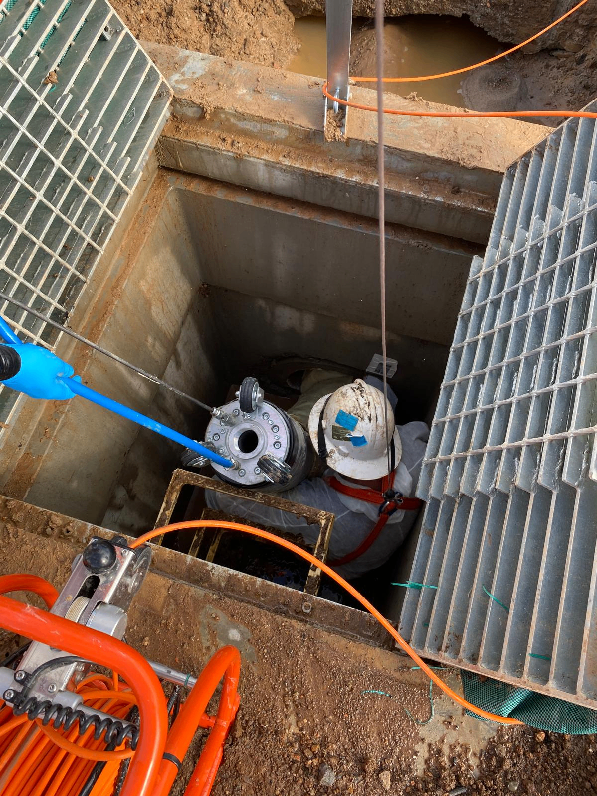 Robotic packer lowered into the pit to position a fibreglass point repair
